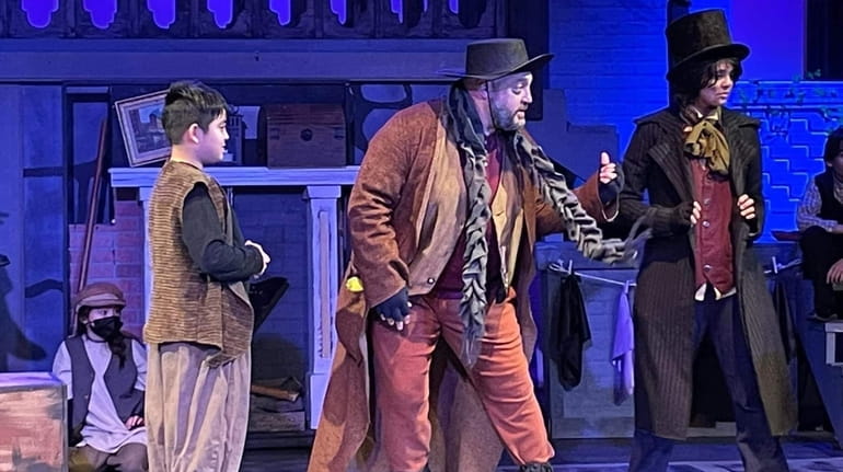 Kevin James plays Fagin with son Kannon, 10, as Oliver and...