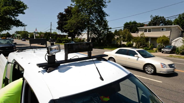 A "mobile unit" speed camera sits on Stewart Avenue in...