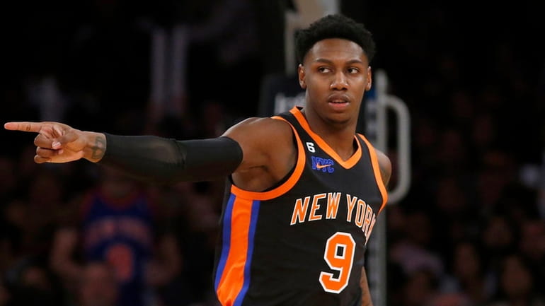 RJ Barrett #9 of the Knicks reacts after a basket during...