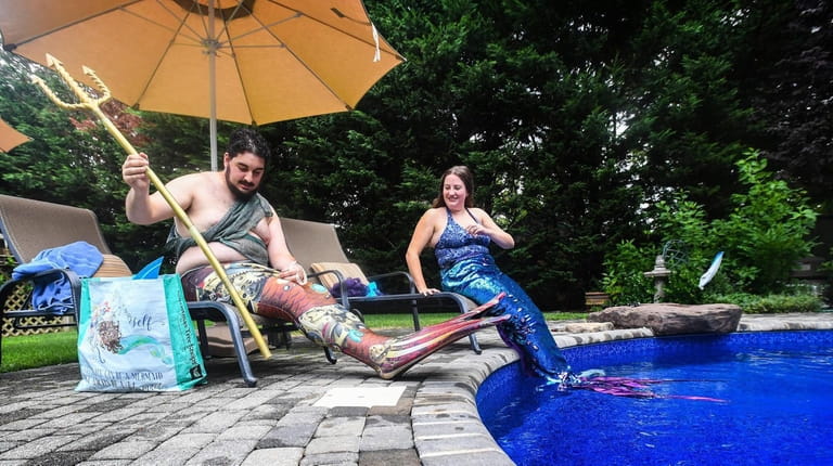 Long Island mermaid pod members Nicole Oliva (aka Mermaid Aria)...