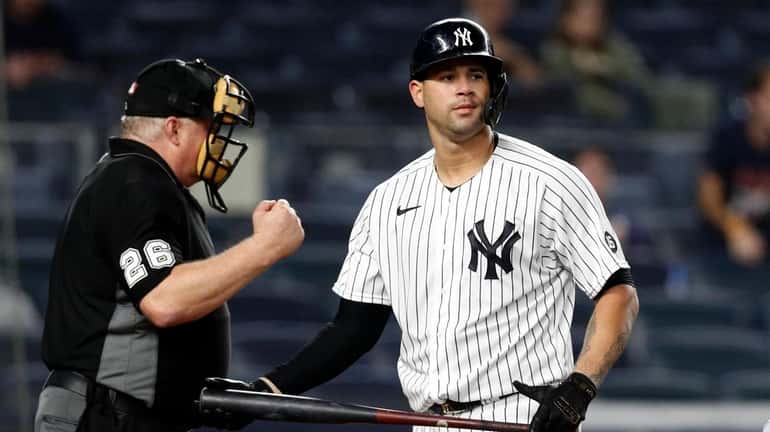 Gary Sanchez #24 of the Yankees strikes out to end a...