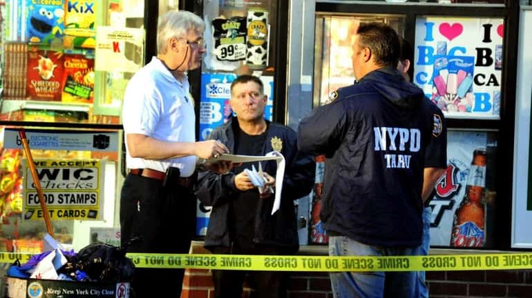 New York City police investigate the scene of a police-involved...