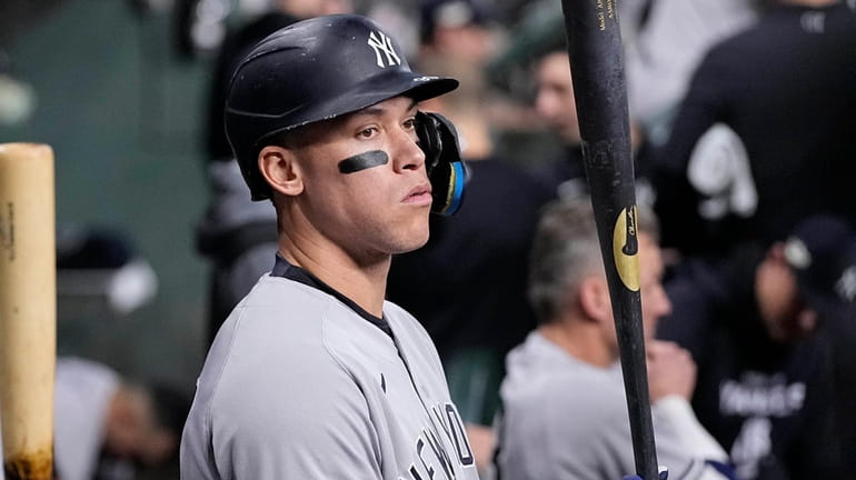 Aaron Judge stands in the dugout ahead of Game 1...