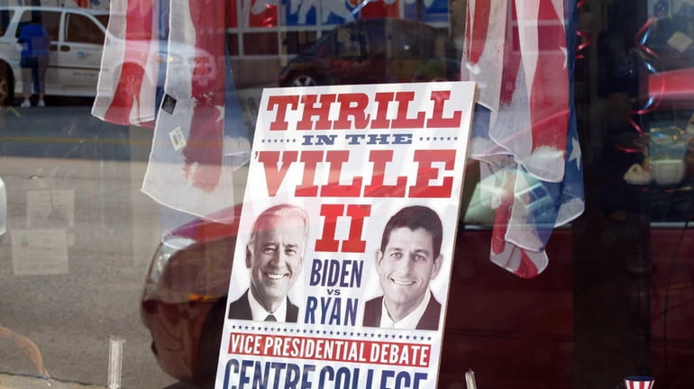 A sign in a business window touting the vice presidential...