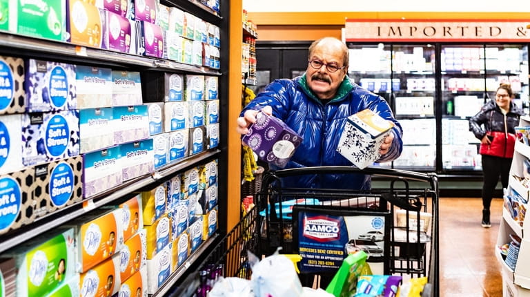 Hal White of Roslyn stocks up on essentials at Uncle...