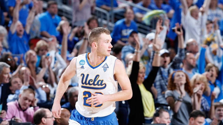 Bryce Alford of UCLA runs down the court against UAB...