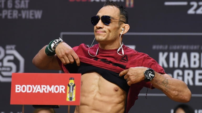  Tony Ferguson poses during a ceremonial weigh-in for UFC 229...