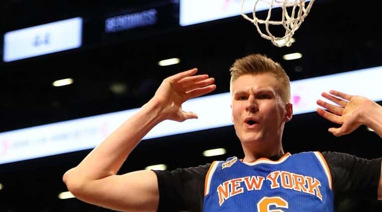 Kristaps Porzingis #6 of the New York Knicks dunks against...