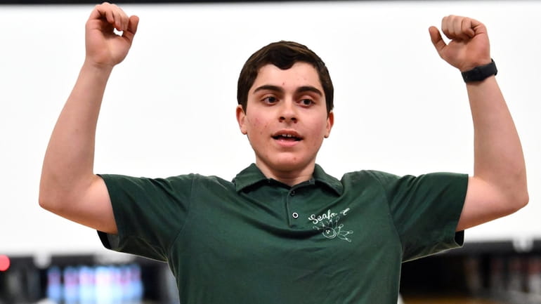 Andrew Ceraulo of Seaford celebrates his win after rolling a strike...