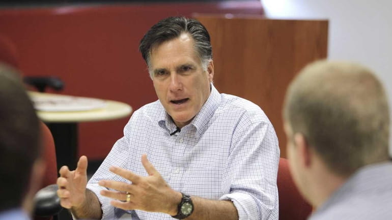 Republican presidential hopeful and former Massachusetts Gov. Mitt Romney meets...