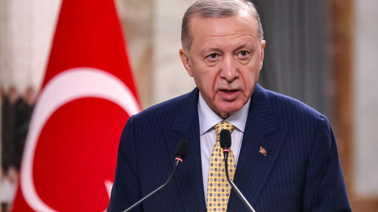 Turkish President Recep Tayyip Erdogan speaks during a joint statement...