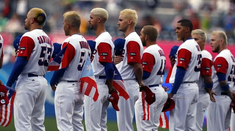 A view of Puerto Rico's team players with their hair...