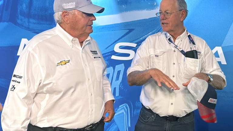 NASCAR team owner Rick Hendrick, left, and NASCAR chairman Jim...