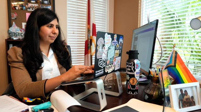 Florida state Rep. Anna Eskamani works in her office Wednesday,...