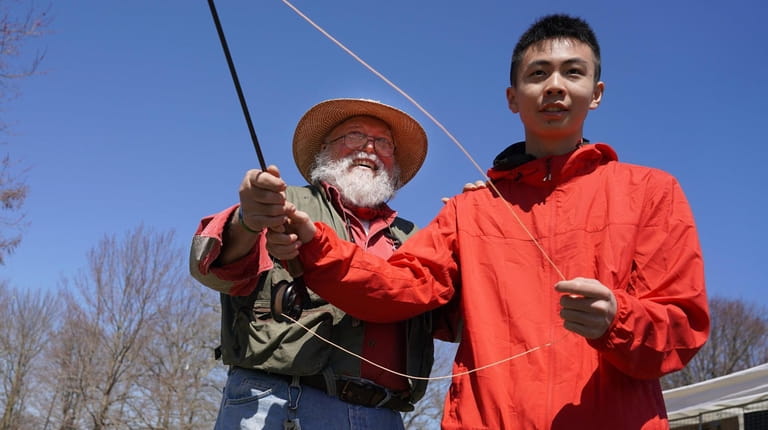George Costa, left, of Mastic Beach, with Art Flick Trout...