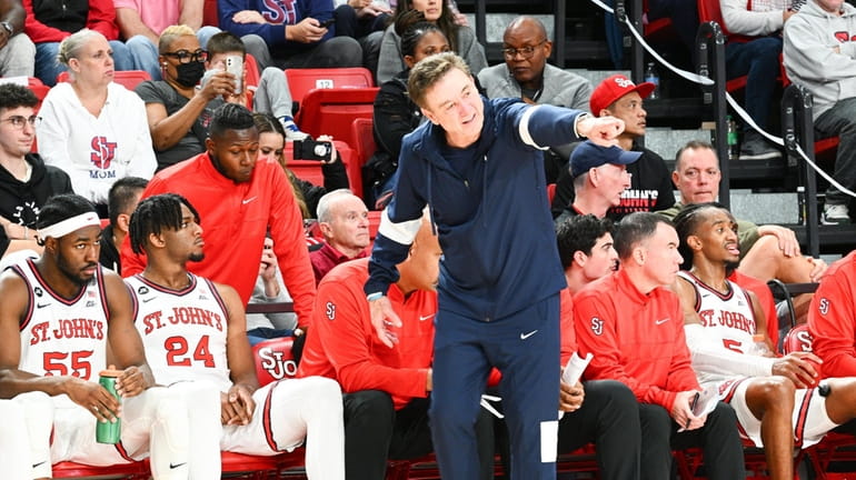 St. John's coach Rick Pitino points from the sidelines during...
