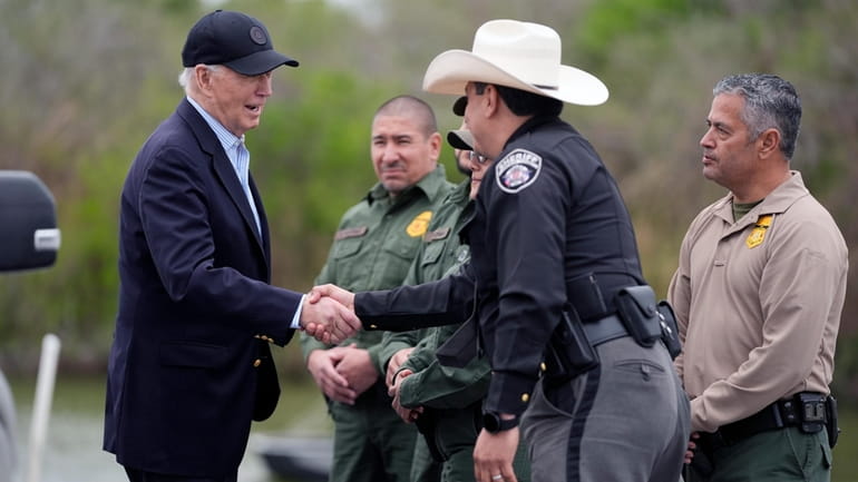 President Joe Biden talks with the U.S. Border Patrol and...
