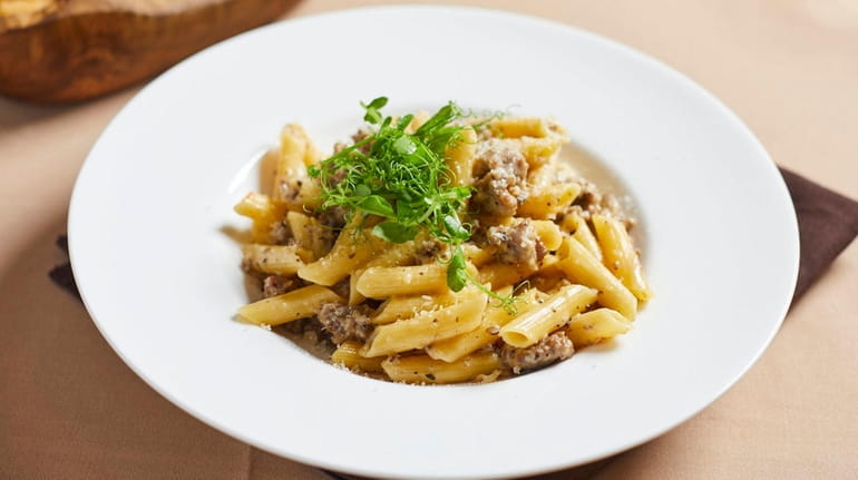 Gluten-free pasta with homemade Umbrian sausage and creamy white mushroom...