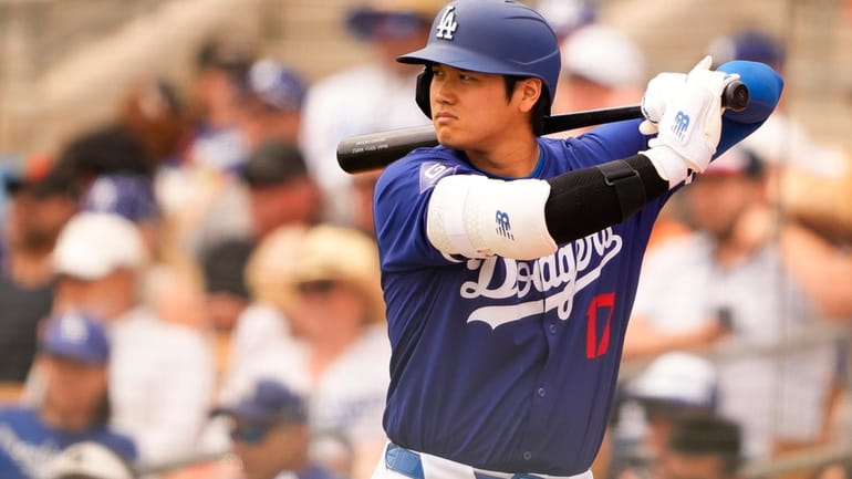 Los Angeles Dodgers designated hitter Shohei Ohtani waits on deck...