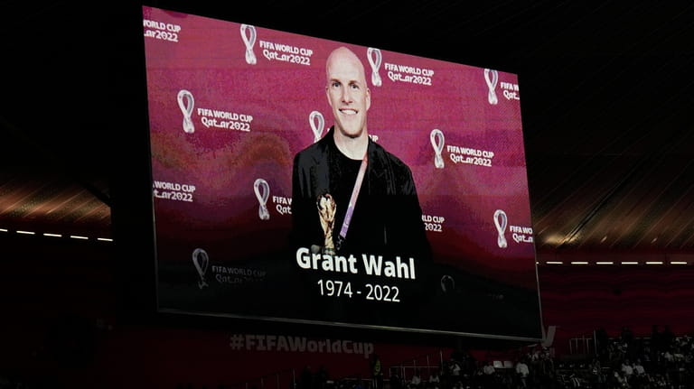 A tribute to journalist Grant Wahl is show on a...