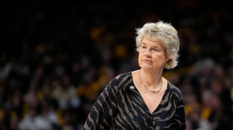 Iowa head coach Lisa Bluder watches her team in the...