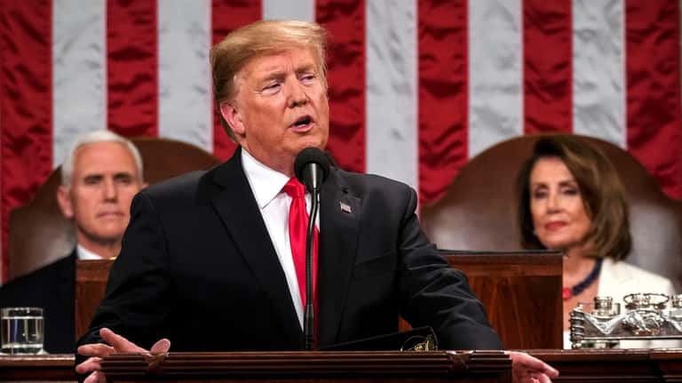 President Donald Trump delivers the State of the Union address, with...