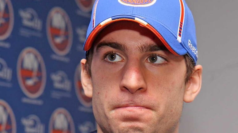John Tavares talks to reporters as the Islanders clean out...