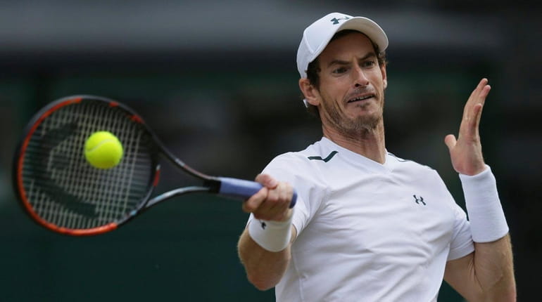 Britain's Andy Murray returns to Sam Querrey of the United...