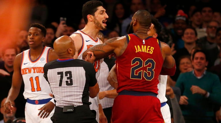LeBron James of the Cavaliers has words with Enes Kanter...