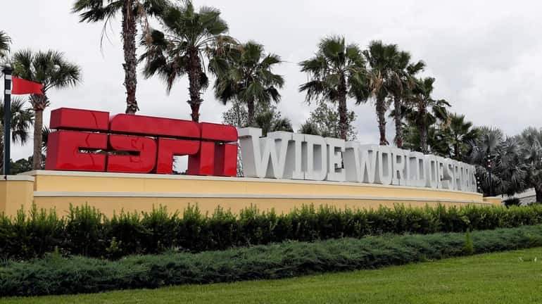 A sign marking the entrance to ESPN's Wide World of...