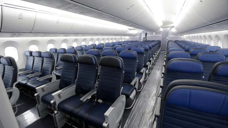 Economy class seating is shown on a new United Airlines...