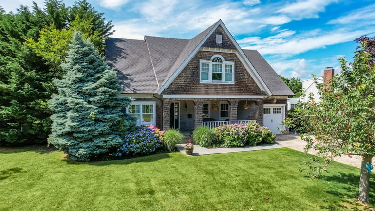 The 3,000-square-foot Nantucket-style house has four bedrooms and 2½ bathrooms.
