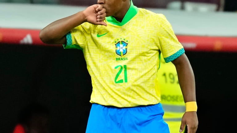 Brazil's Endrick celebrates after scoring his side's second goal during...