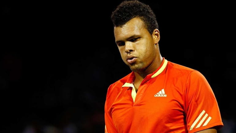 Jo-Wilfried Tsonga of France looks on during a match against...