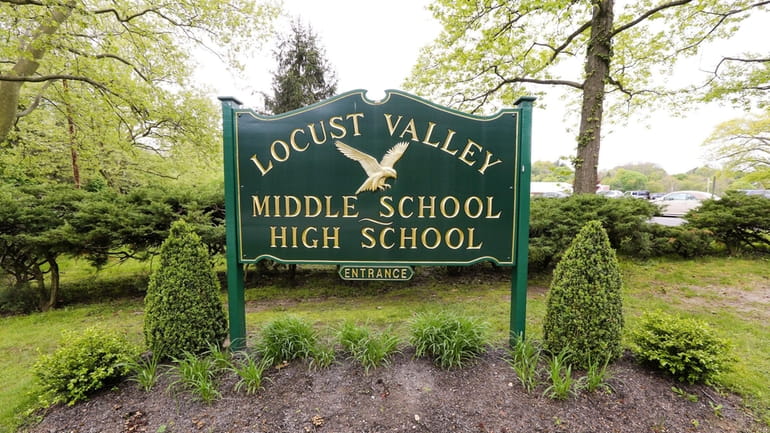 A former Locust Valley Middle School teacher caught in an...