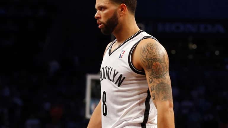 Deron Williams of the Nets looks on late in the...