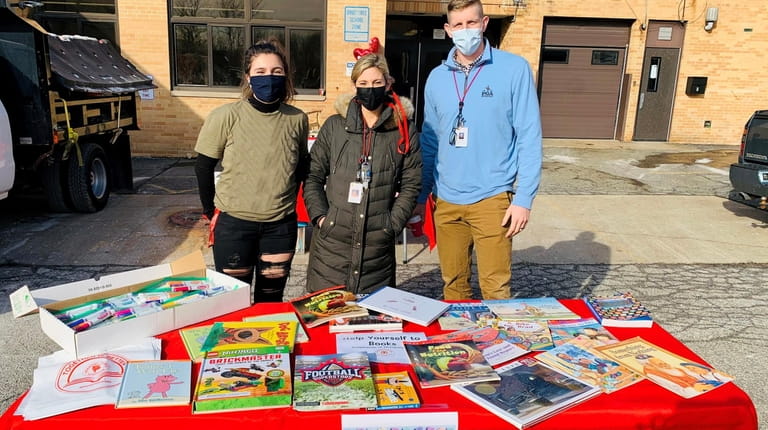 Freeport School District recently hosted a book pickup event to...