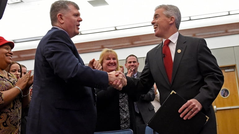 Suffolk County Executive Steve Bellone, right, and Town of Babylon Supervisor...