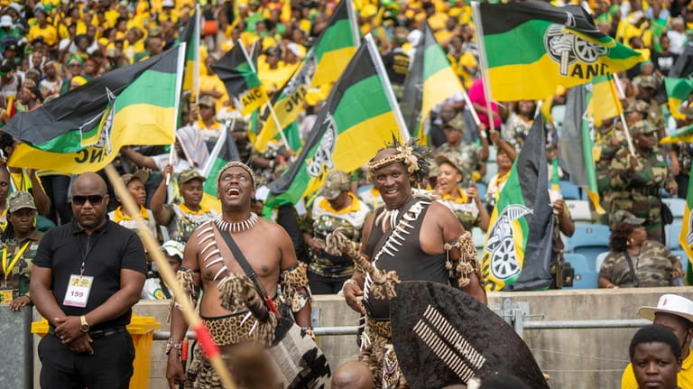 Zulu warriors and African National Congress supporters gather at the...