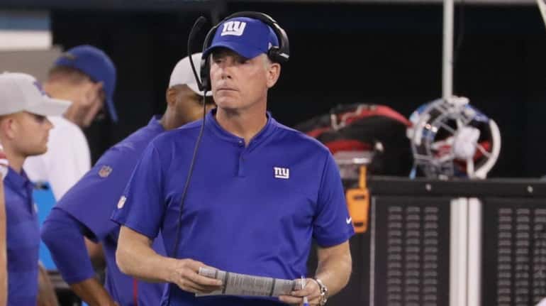 Giants head coach Pat Shurmur looks on from the sideline...