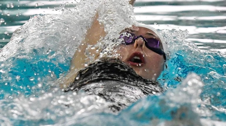 Leah Treglia of Hauppauge-Smithtown competes in the 100 yd backstroke...