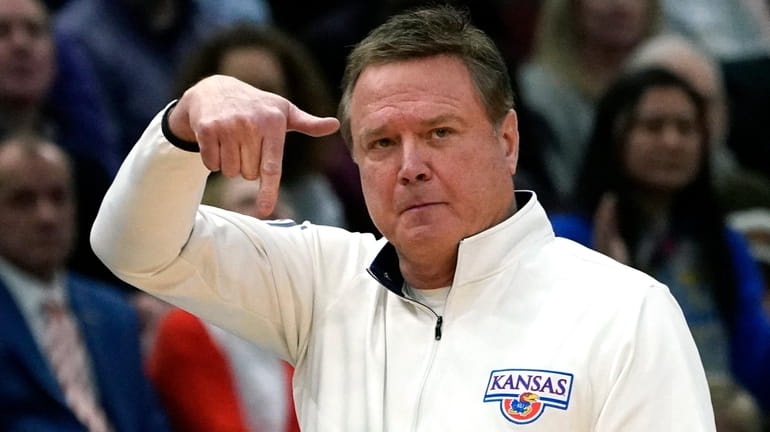 FILE - Kansas head coach Bill Self reacts during the...