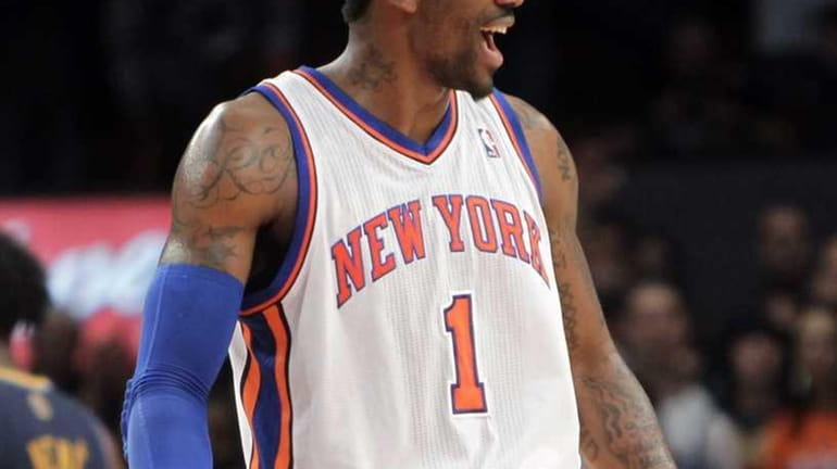New York Knicks' Amare Stoudemire reacts towards the end of...