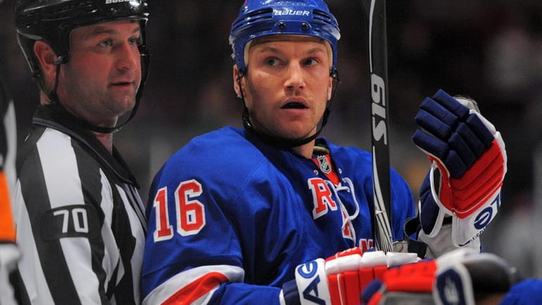 Rangers left winger Sean Avery reacts after being called for...