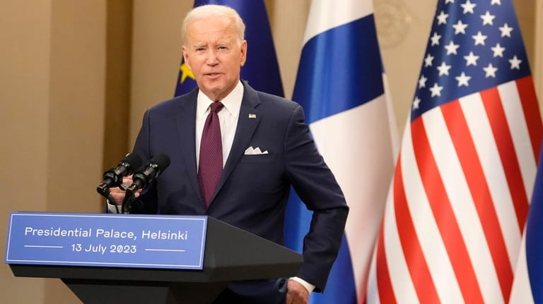 U.S. President Joe Biden attends a press conference in Helsinki,...