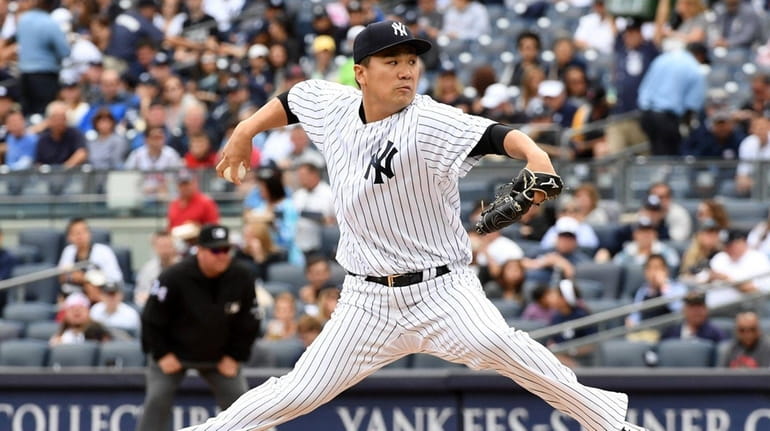 Masahiro Tanaka pitcher for the NY Yankees pitching against the...