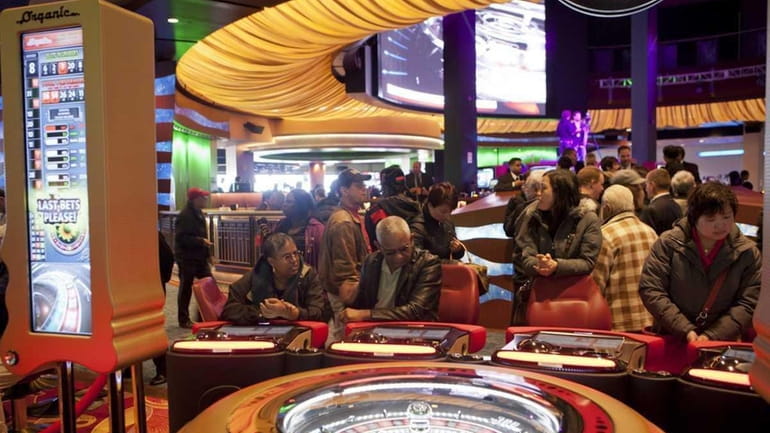 People play video roulette at the new Resorts World Casino-New...