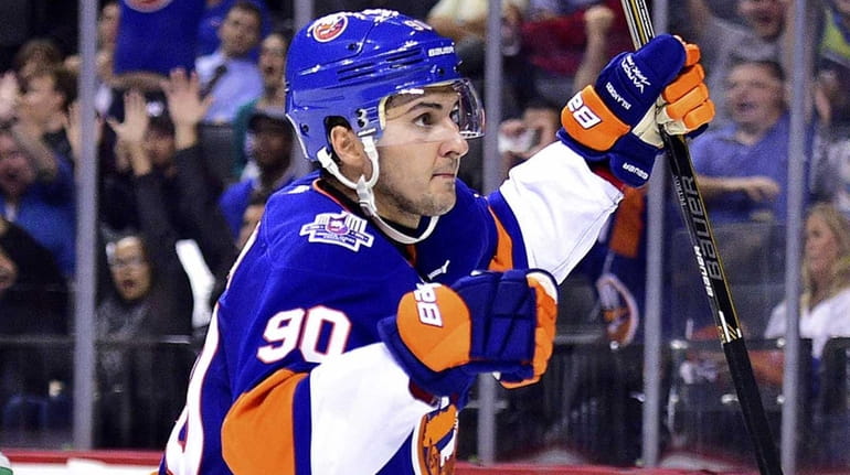 New York Islanders right wing Kirill Petrov celebrates after scoring...