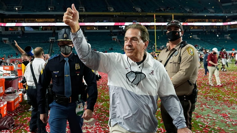 Alabama head coach Nick Saban leaves the field after their...