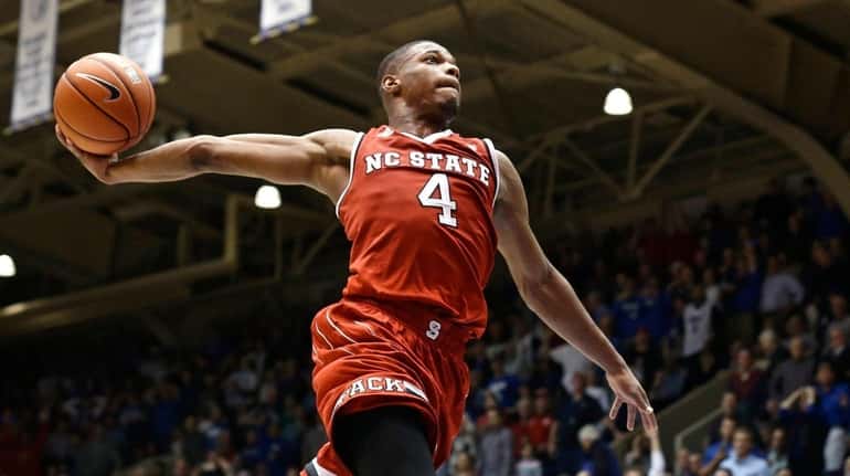 North Carolina State's Dennis Smith Jr. drives to the basket...
